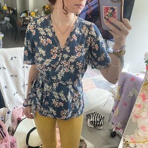 Light blue floral peplum wrap v neck top